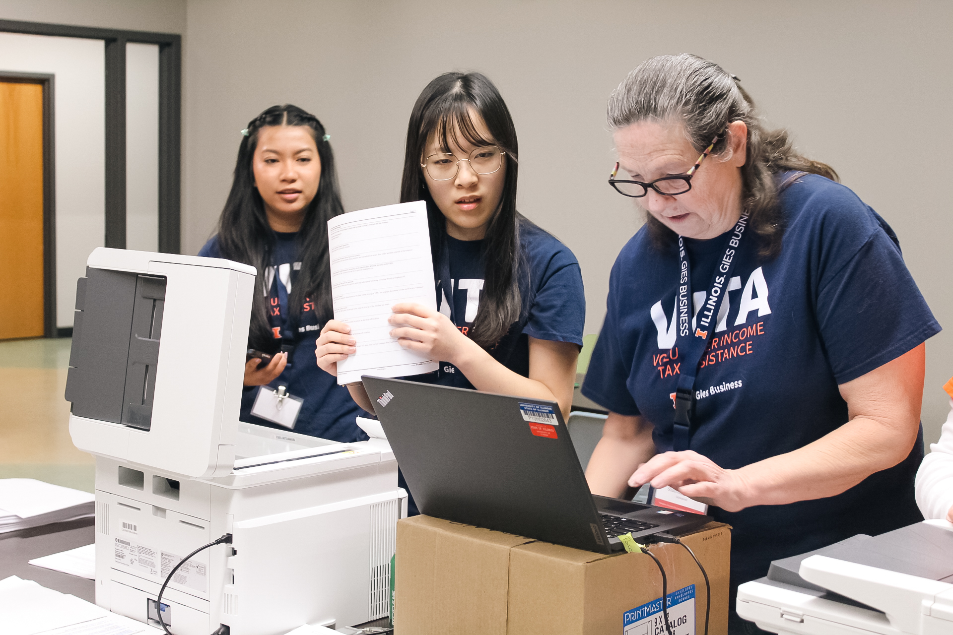 VITA Volunteers and Students working on tax returns